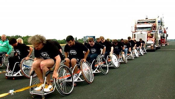 Heaviest Vehicle Pulled Over 100m by a Wheelchair Team